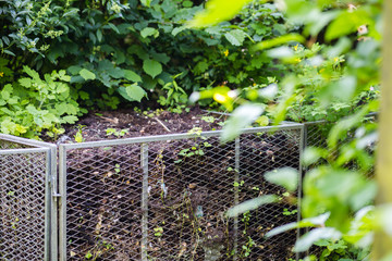 Compost bin in garden