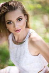 Fototapeta premium portrait of young woman in the forest