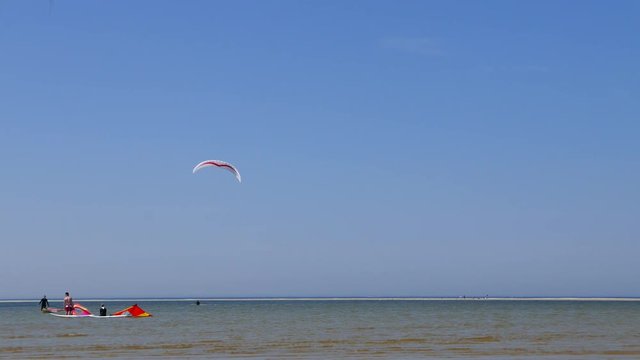 Young male wind surfing professional training near the Beach there Skills 