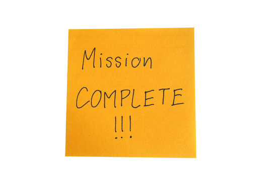 Mission complete words on paper
