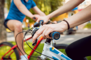 Cycling young couple.