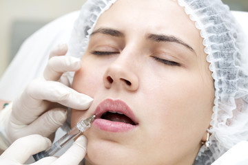 young girl in a clinic contour lips procedure