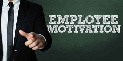Business man pointing with the text: Employee Motivation