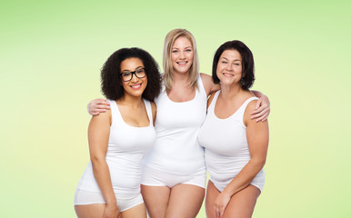 group of happy plus size women in white underwear