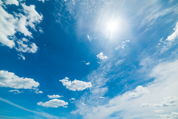 Naklejka na ściany i meble several clouds on a sunny day