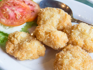 Fried Prawn Cake, crab Cake on a white plate.