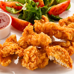Fried chicken nuggets and vegetables