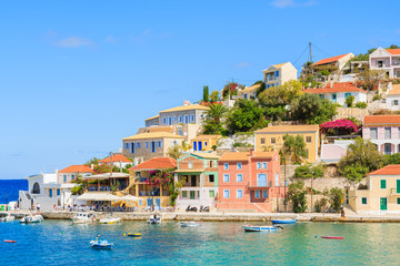 Fototapeta na wymiar Colorful houses of Assos fishing village on coast of Kefalonia island, Greece