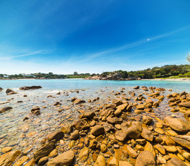 yellow rocks on the shore in Sardinia