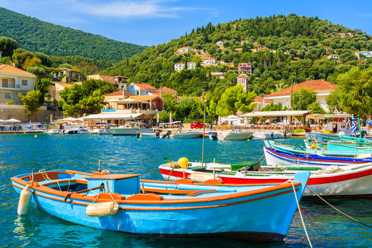 Fototapeta Colorful Greek fishing boats in port of Kioni on Ithaka island, Greece