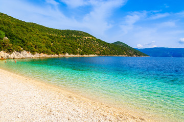 Fototapeta na wymiar Beautiful crystal clear water of Antisamos beach on Kefalonia island, Greece