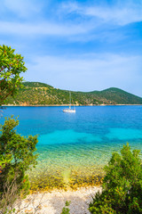 Yacht boat in beautiful bay with Antisamos beach on Kefalonia island, Greece
