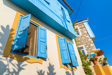 Blue windows of colorful houses in Kokkari village, Samos island, Greece