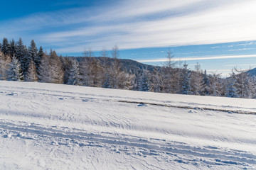 Fototapeta na wymiar Winter landscape of Beskid Sadecki Mountains on sunny day, Poland