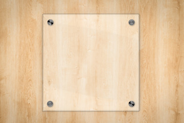 glass board on wooden background