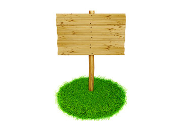 Advertising sign stands in fresh grass tufts