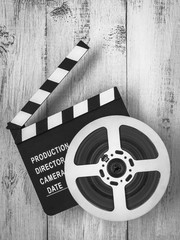 Clapperboards and the reel of film