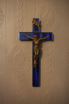 Cross hanging on a wall.