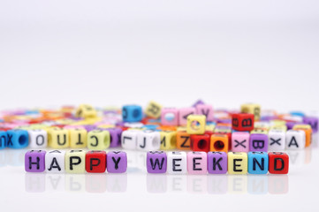 HAPPY WEEKEND Words with Dices On White Background