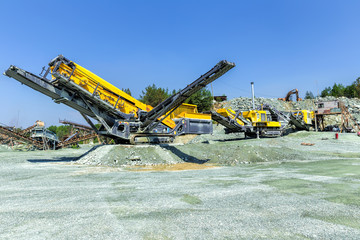 Open pit mining and processing plant for crushed stone, sand and gravel to be used in the roads and...