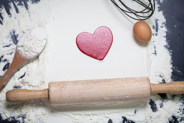 desk of wood with mark of heart in flour