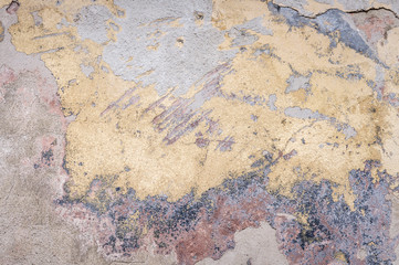 old house wall with cracked plaster