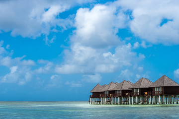 Beautiful beach with water bungalows at Maldives