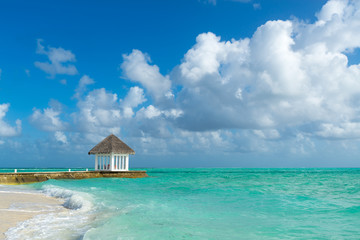 Beautiful beach with water bungalows at Maldives