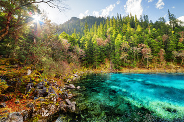 The Five Coloured Pool with azure water among mountains