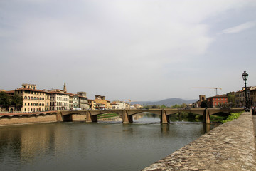 Obraz premium Urban landscape with bridge over river Arno in Florence, Italy