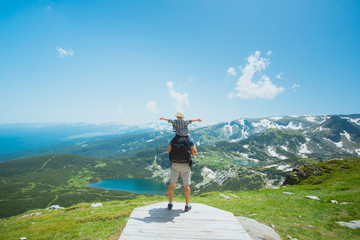 Father and his son hiking in mountains, Bulgaria