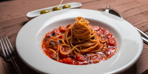 pasta seafood in tomato sauce with shrimp and tomatoes