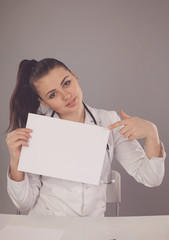 Naklejka premium Nurse and a paper