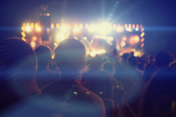 Silhouettes of people and musicians