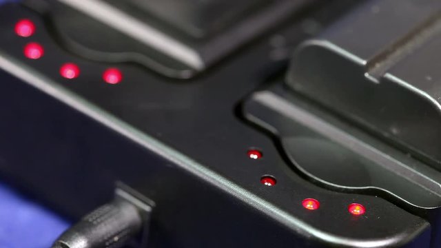 The accumulators charging battery indicator. Charging level lamp light up and die away