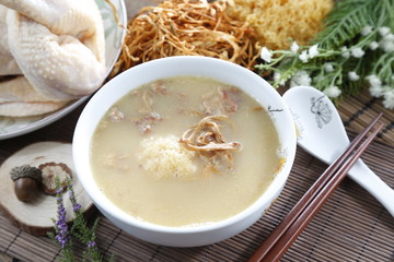 Traditional chinese bowl of porridge on the table in restaurant
