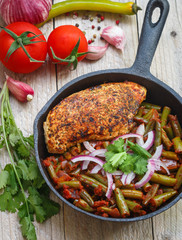 Spicy green beans with tomatoes,onions, cilantro and roasted the meat in the pan