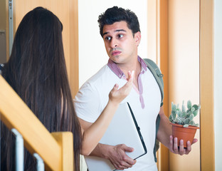 Husband leaving woman.