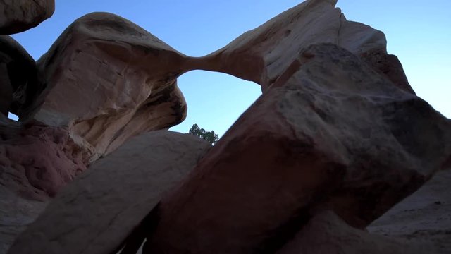 Young Woman Hiker in Devil's Garden Grand Staircase Escalante National Monument slow Trucking