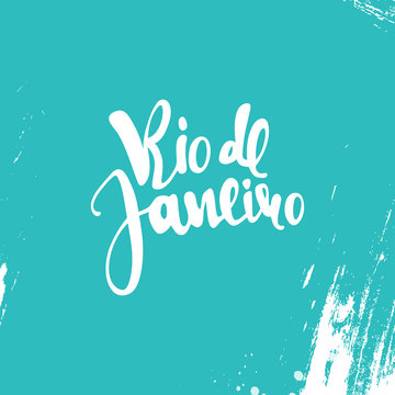 Rio de Janeiro inscription, on a blue background. Calligraphy handmade greeting cards, posters phrase Rio de Janeiro. Background watercolor brush blue , Brazil carnival