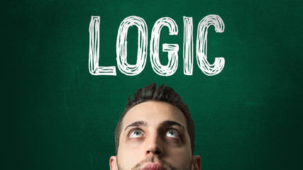 Guy Looking Up in a Chalkboard with the text: Logic