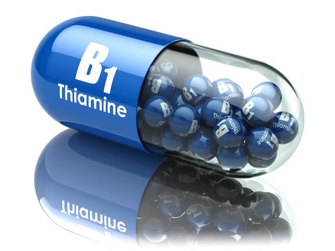 Vitamin B1 capsule. Pill with thiamine. Dietary supplements.