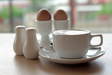 coffee and soft boiled egg in eggcup