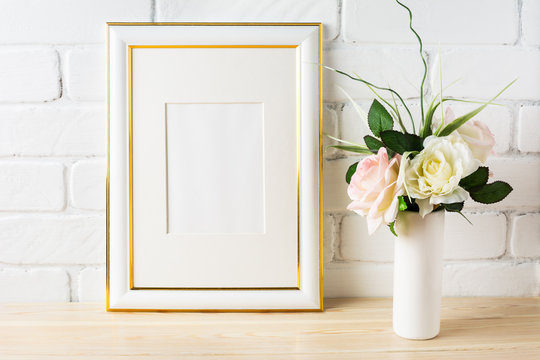 White frame mockup with pale pink roses in vase