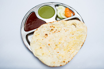 Indian tray meal with bread and sauce