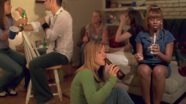 Teenagers drinking at an unsupervised house party