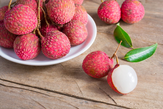 Lychee, Fresh lychee and peeled showing the red skin and white f