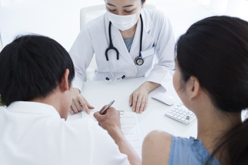 The couple have signed the consent form at the hospital