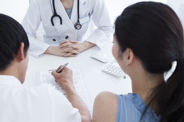 The couple have signed the consent form at the hospital