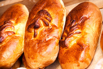 Fresh buns on the counter of the store as background